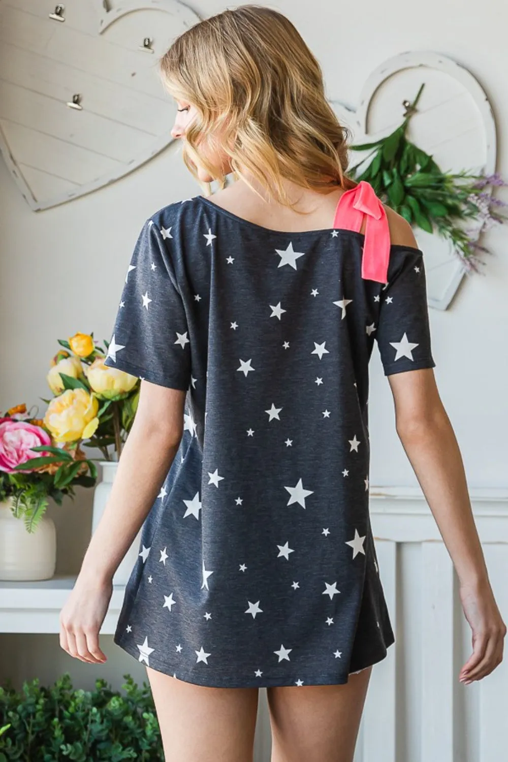 Heimish Full Size Star Print Asymmetrical Neck Short Sleeve Top